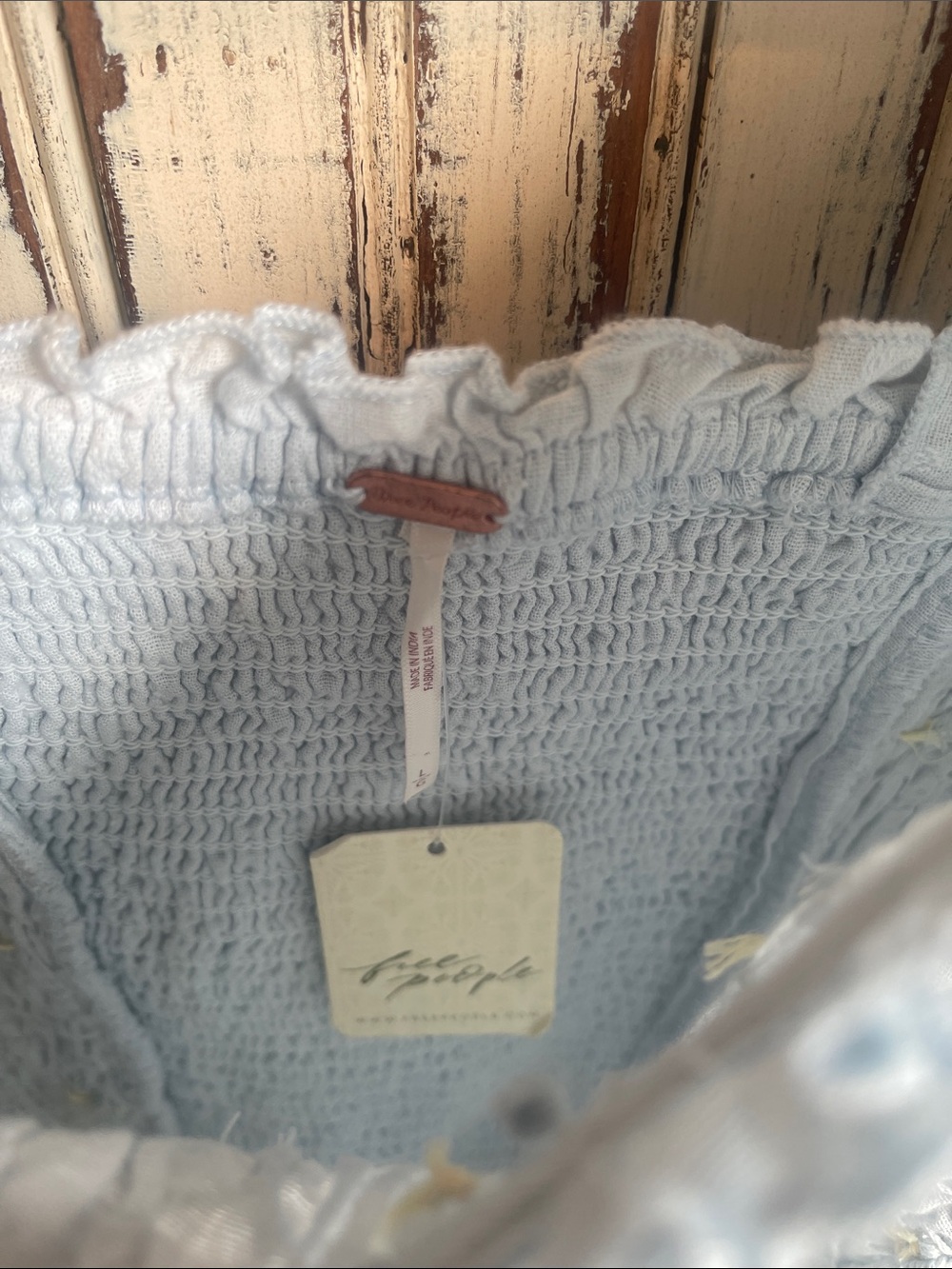 Light Blue Smocked Puff Sleeve Top with Floral Details - Picture 7 of 11